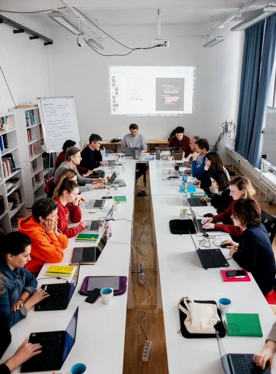 Academy participants working on their projects